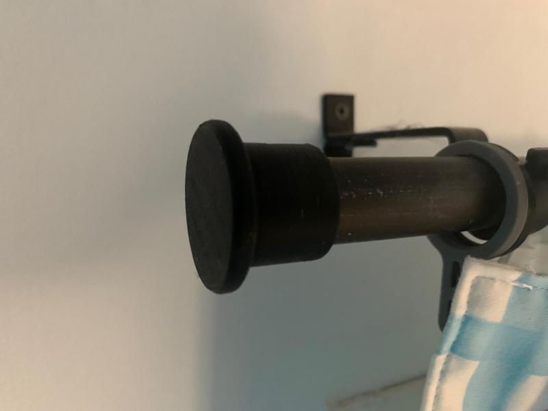 End cap for curtain rod