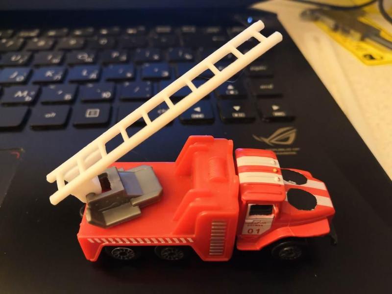 Toy fire-truck ladder