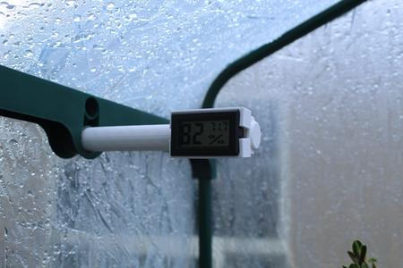 Hydrometer mount for greenhouse