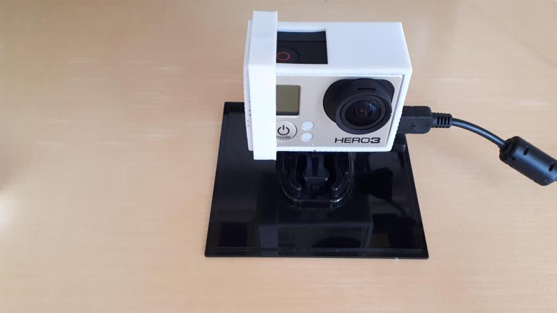 Gopro case w/ holes so you can charge / plug mics in