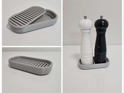 Stand for salt and pepper mills.