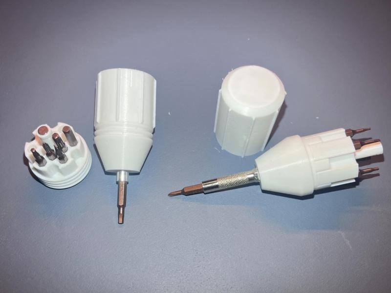 One-piece tool for handle and screwdriver bit storage