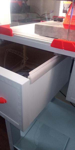Drawer tracks for enclosure