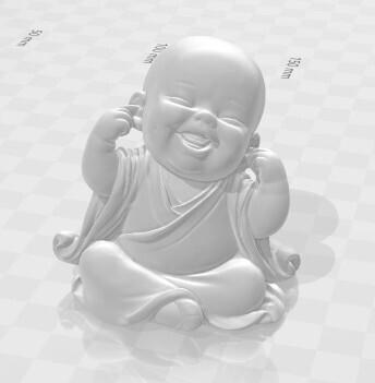Little Buddha smiling, covering his ears