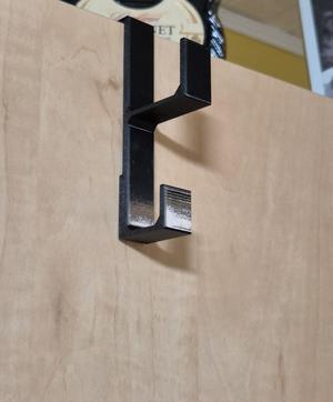 Wardrobe door hanger