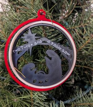 Two T-Rex and a Table Saw Nativity Ornament