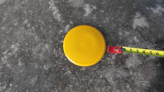 Disc golf tape measure retriever