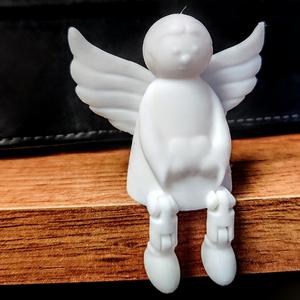 Seated angel
