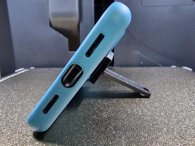 portable phone stand attached
