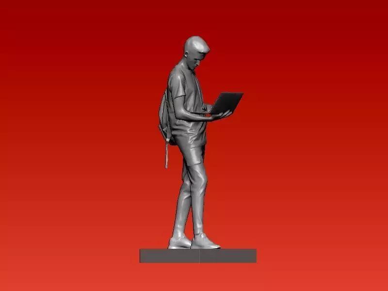 Young man pressing laptop model - 3D print