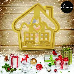 CUTTER OF COOKIES MERRY CHRISTMAS