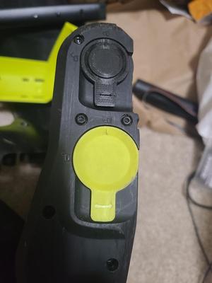 Ryobi PBLSV718 Pet Stick Vac Front Roller Locking Mechanism