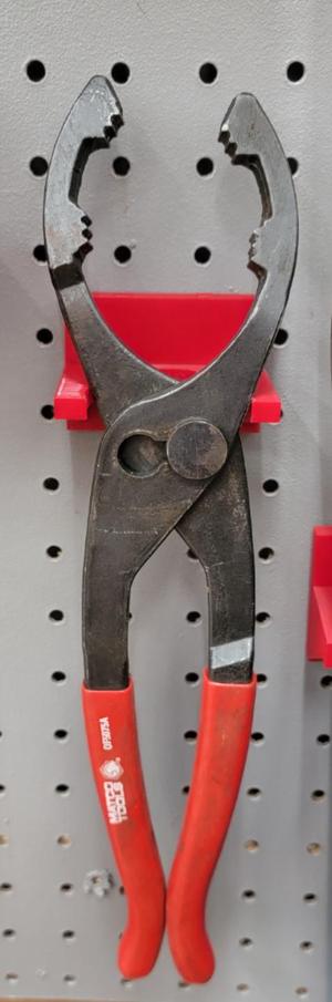 oil filter wrench holder for peg board