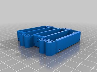 Flexing Battery Holder with Alternating Orientation