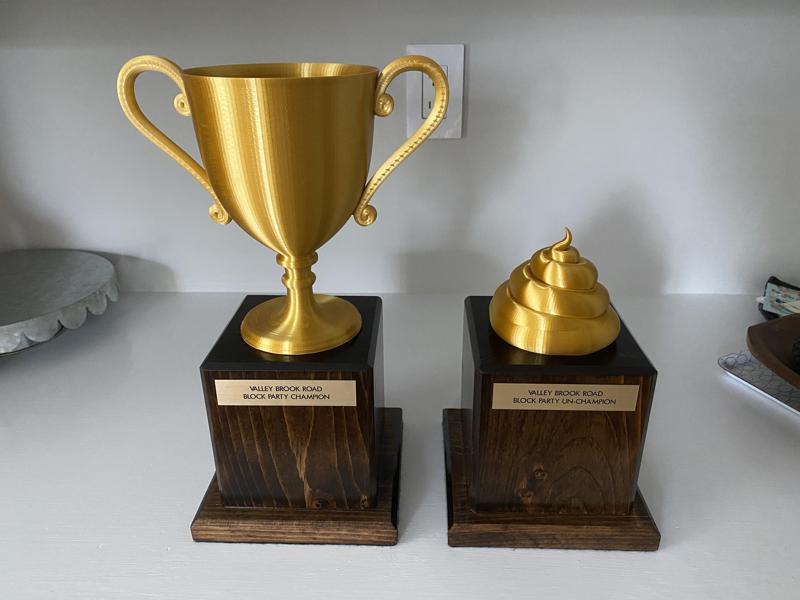 Champion and Un-champion trophies