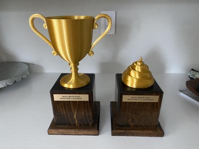 Champion and Un-champion trophies