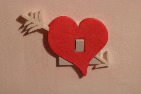 Heart arrow light switch cover