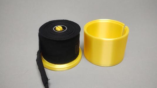 Boxing wrap roller / container