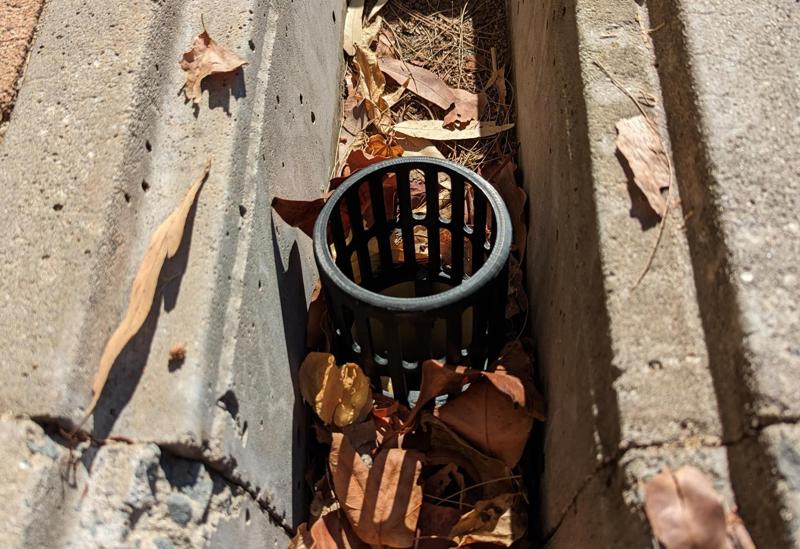 Strip drain leaf strainer. Open top so it can't block.