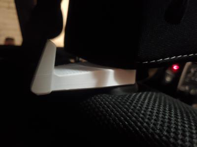 Headrest hook with shade mount