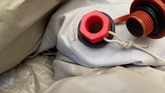 Boston deflation adapter with hole