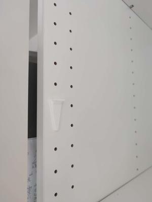 Ikea Skeleton cabinet shelf pegs