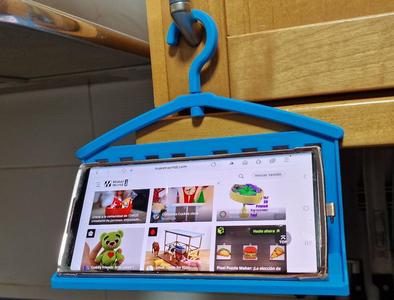 Mobile holder with rotating hook Soporte giratorio