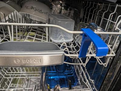 Dishwasher door prop