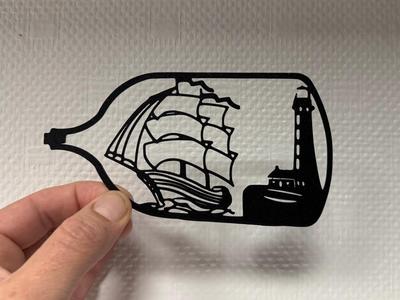 Decor bottle, boat and lighthouse