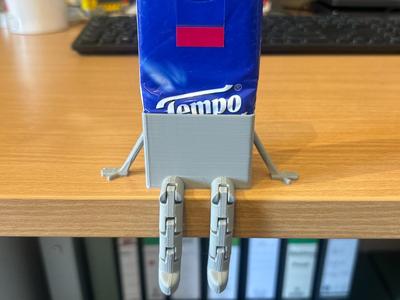 Articulated, movable tissue box buddy
