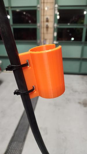 Extension Cord Plug-Head Holder