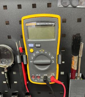Square pegboard holder for Fluke 15B