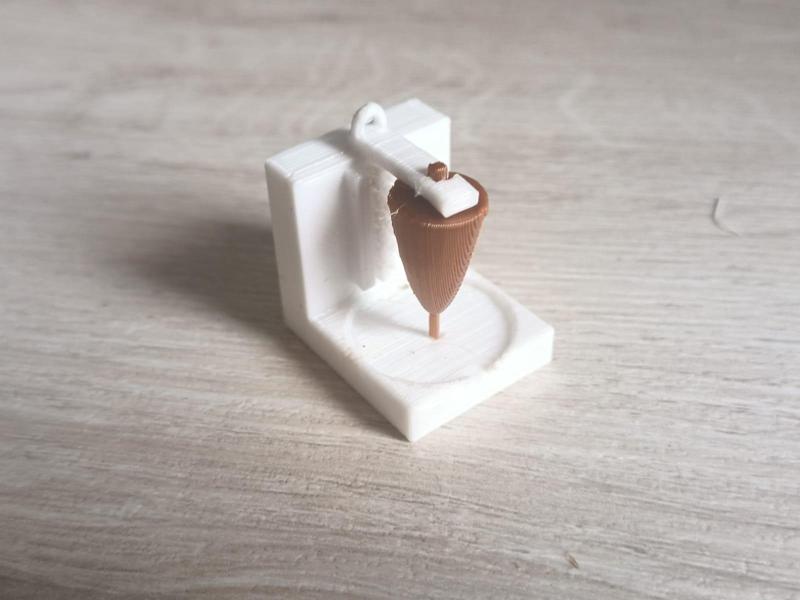 Mini keychain of a taco al pastor taco spinner