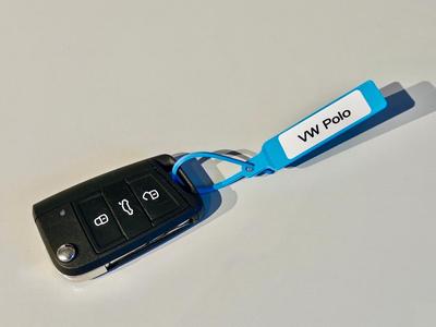 Flexible ringless key tag for quick marking
