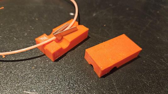 Filament trimmer