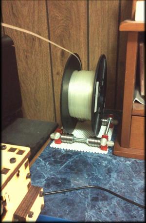 Universal filament spool cradle with endcaps