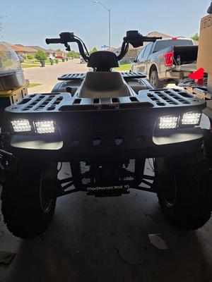 Polaris front/rear rack mounting bracket