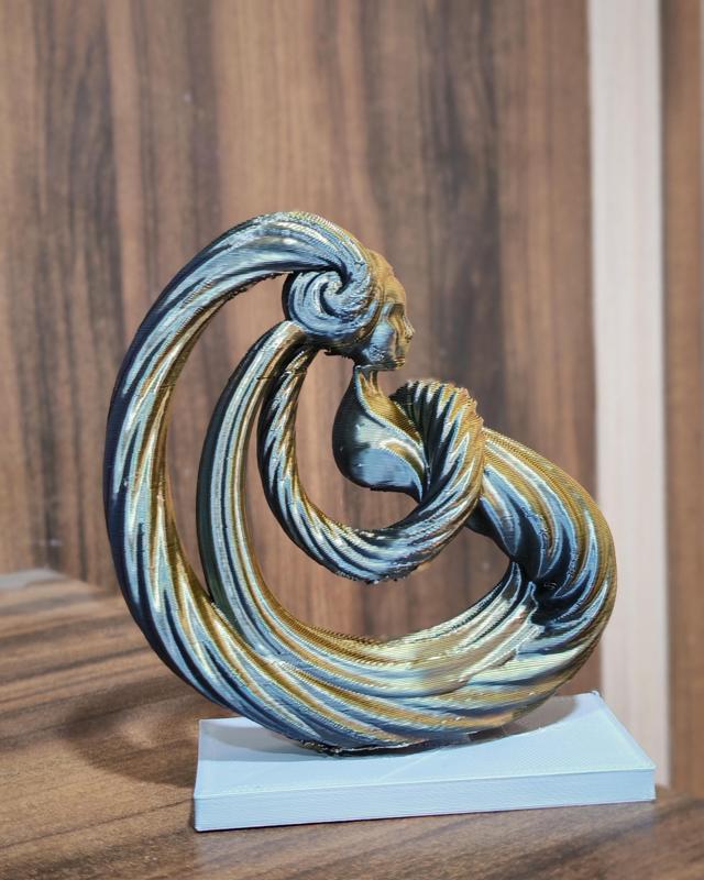 Golden grace sculpture