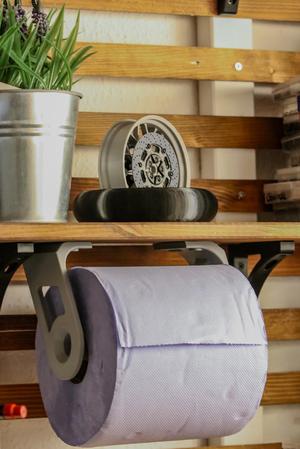 Paper/cleaning cloth roll holder