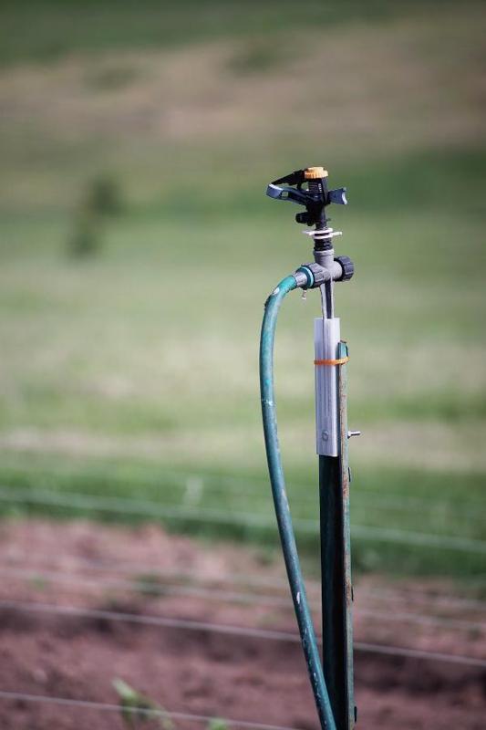 Mount for Impulse Sprinkler on Green Metal U Post