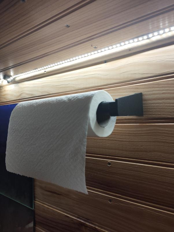 Wall mounted paper towel holder