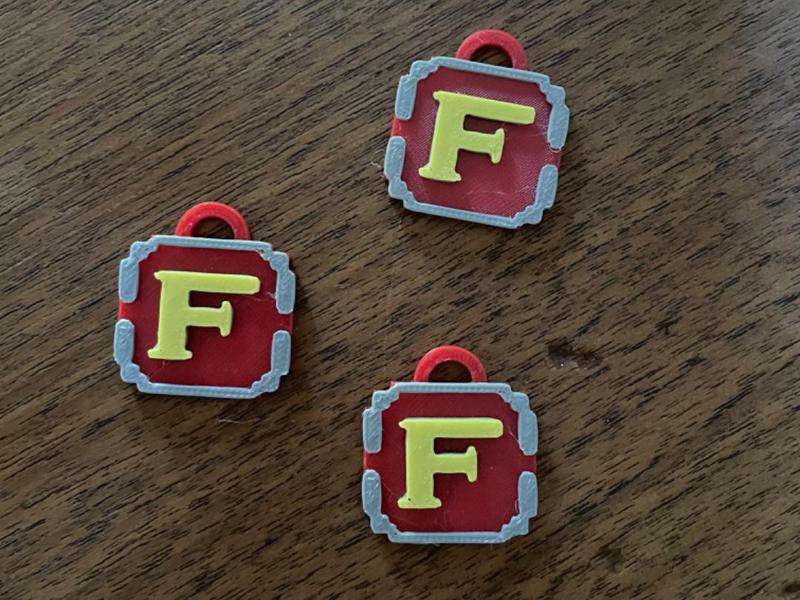 Metal Slug flame keychain