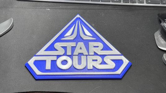 Star Tours logo sign