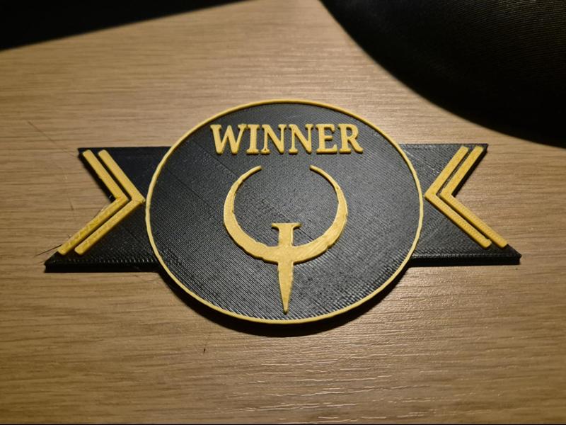 Quake winner emblem