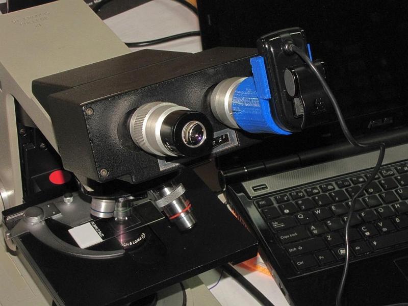 Microscope adapter for Logitech web-cam lets you shoot video through your microscope