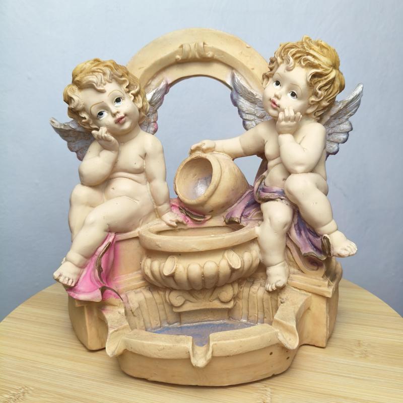 Angels in fountain