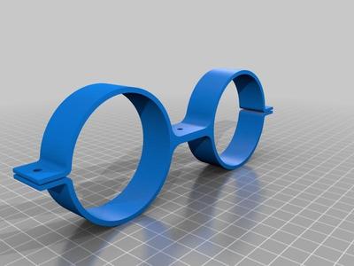 Clip to hold two 60.5mm diameter ABS pipes 100mm apart.