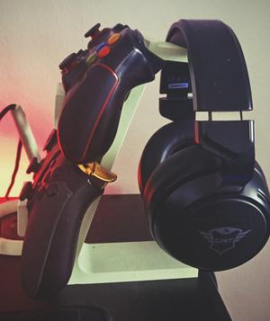 Stand for two controllers and headphones