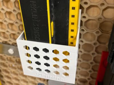 Stud finder multiboard wall holder