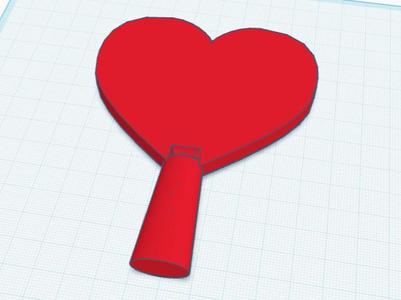 Heart-shaped ping pong paddle